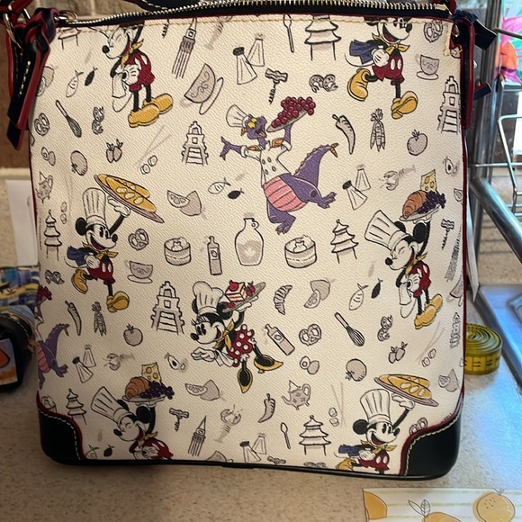 A EPCOT Food and wine festival Dooney and Bourke from 2018. - Picture 2 of 7